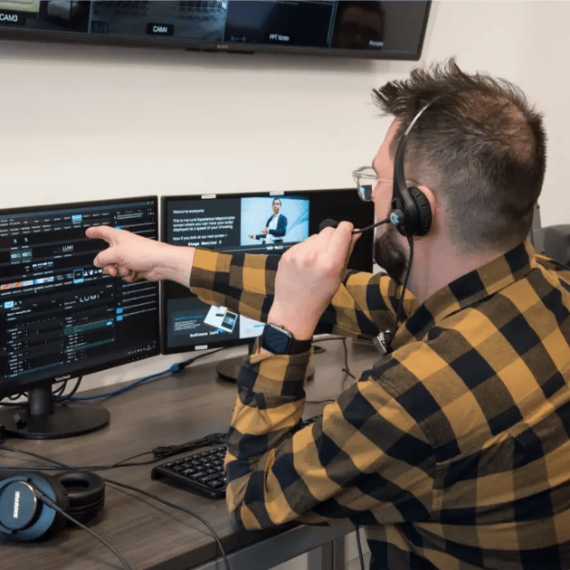Man pointing at a screen