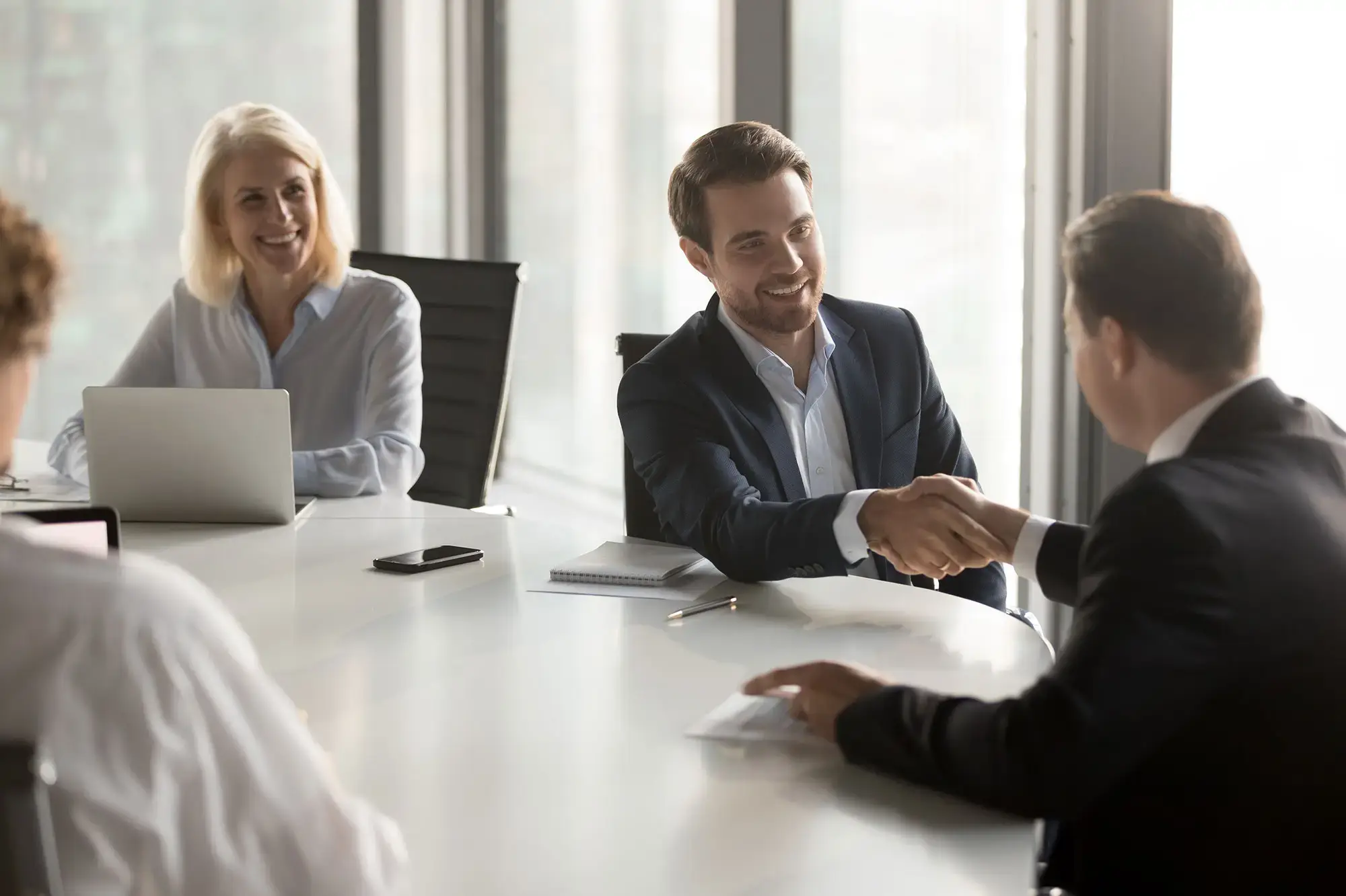 lumi-global-investor-relations-shaking-hands-office-hero